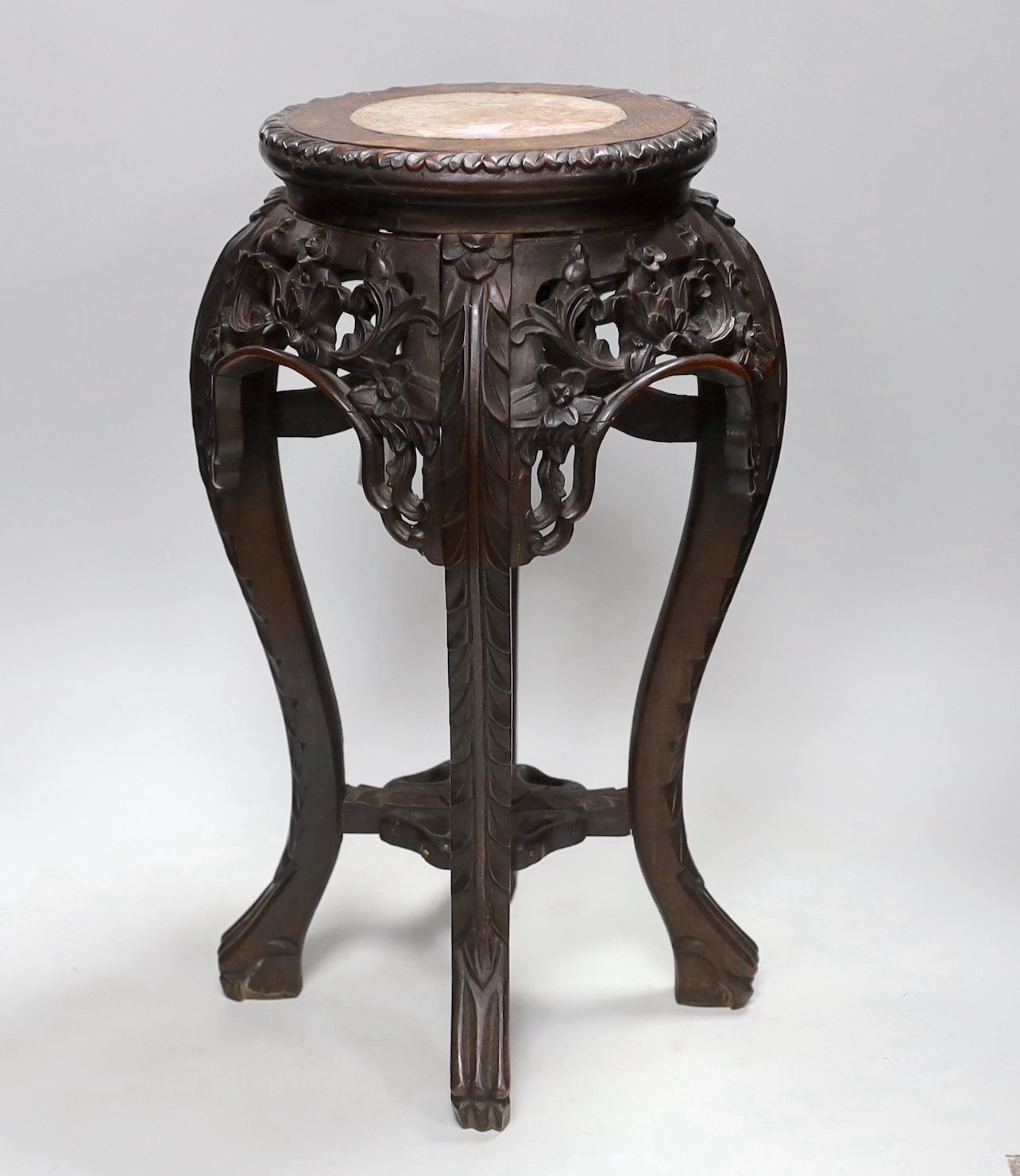 A Chinese carved hardwood marble topped vase stand, height 46cm